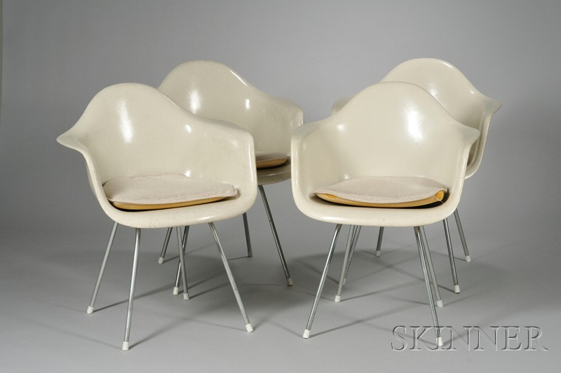 Appraisal: Four Charles and Ray Eames Armchairs Fiberglass and metal Manufactured