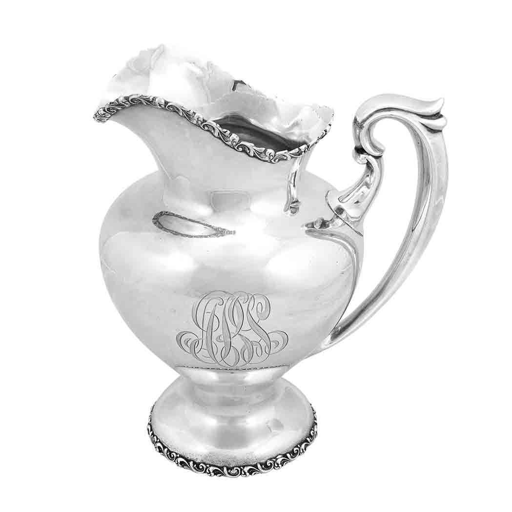 Appraisal: Reed Barton Sterling Silver Water Pitcher With a scrolling edge