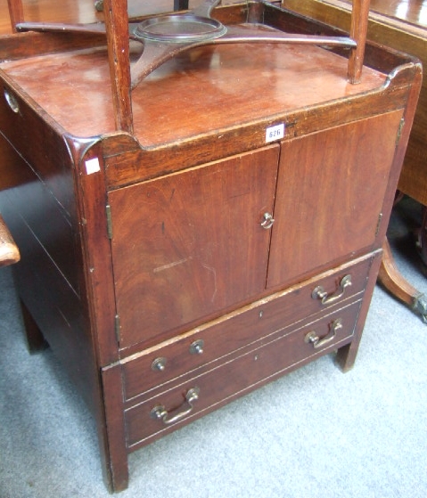 Appraisal: A George III mahogany tray top washstand with pierced carrying