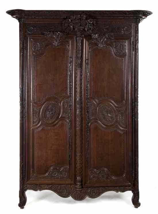 Appraisal: A Brittany Carved Armoire th century and later having a