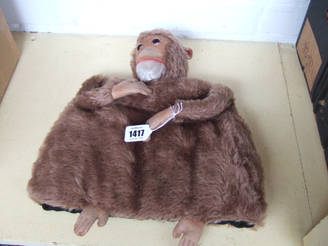 Appraisal: A Stieff tea cosy modelled as a monkey early th