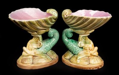 Appraisal: A pair of Majolica nautilus shells with dolphin supports cm