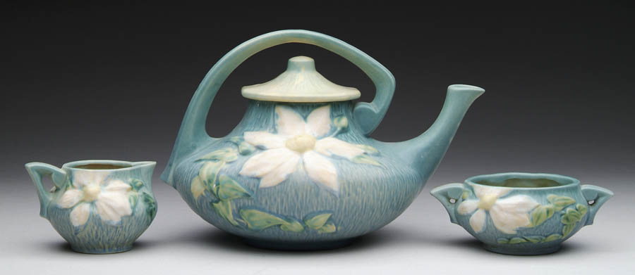 Appraisal: THREE-PIECE ROSEVILLE WATER LILY TEA SET - h handled sugar