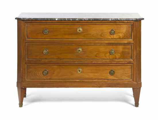 Appraisal: A Directoire Style Fruitwood Commode having a rectangular marble top