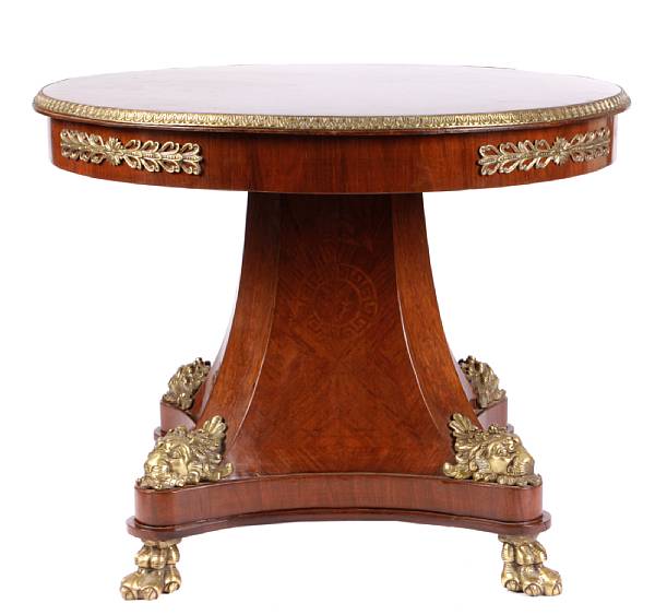 Appraisal: An Empire style inlaid mahogany bronze mounted table height in