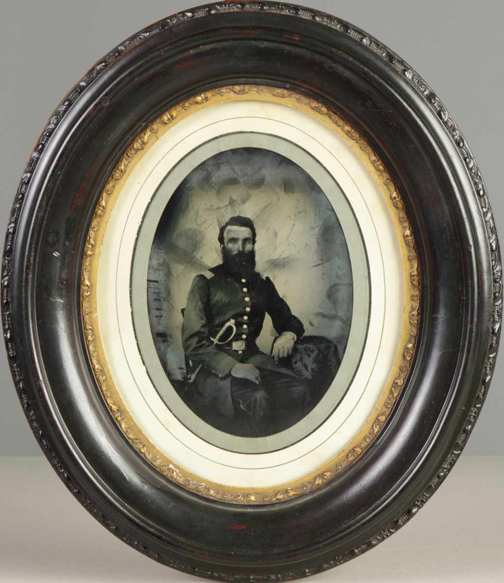 Appraisal: Half Plate Photographic Image Embossed on glass Union officer seated