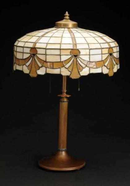 Appraisal: Victorian Leaded Glass Lamp in Drapery Design Description Brass base