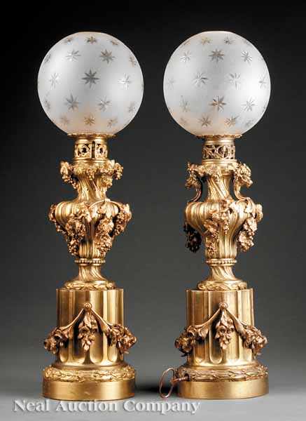 Appraisal: A Good Pair of French Gilt Bronze Carcel Lamps c