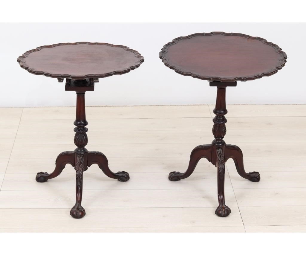 Appraisal: Pair of Chippendale style mahogany candlestands circa Both approx h