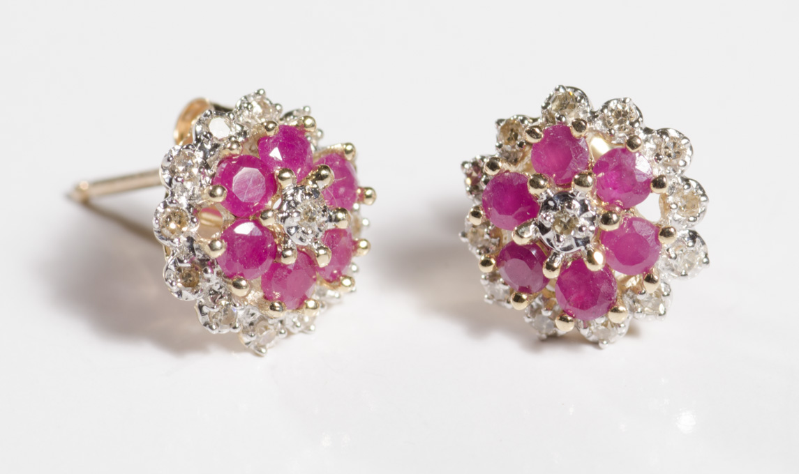 Appraisal: PAIR OF RUBY AND DIAMOND EARRINGS each k yellow and