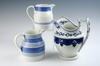 Appraisal: PITCHERS - Lot of three blue decorated soft paste and