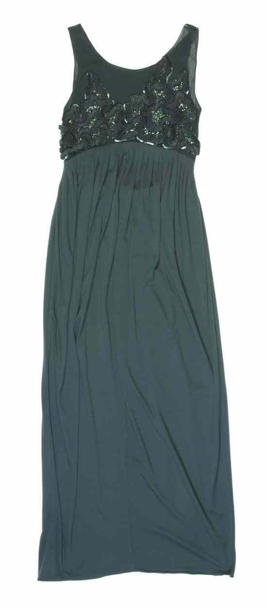 Appraisal: A Geoffrey Beene Green Jersey Evening Dress with a sheer