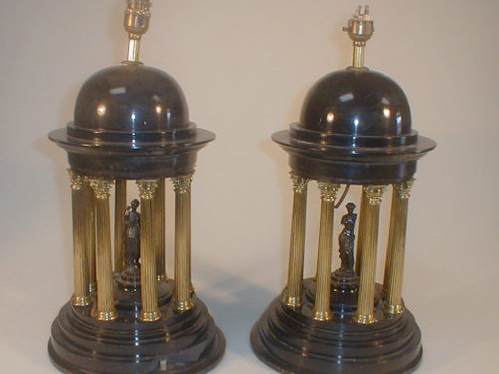 Appraisal: A pair of black slate and gilt metal table lamps