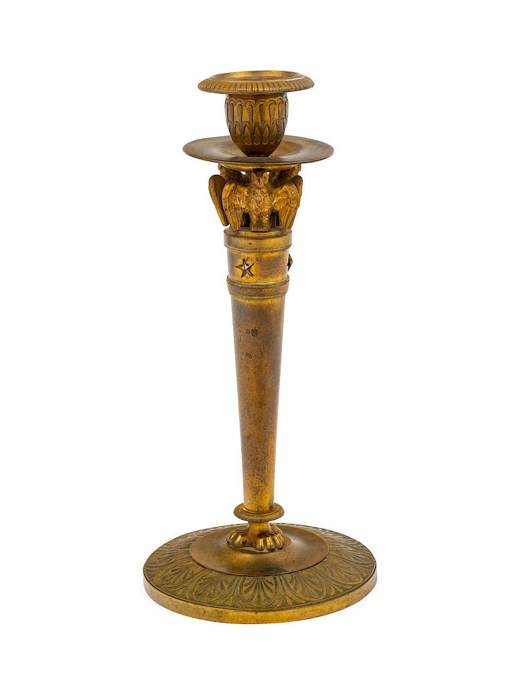 Appraisal: An Empire Style Gilt Metal Candlestick Height An Empire Style