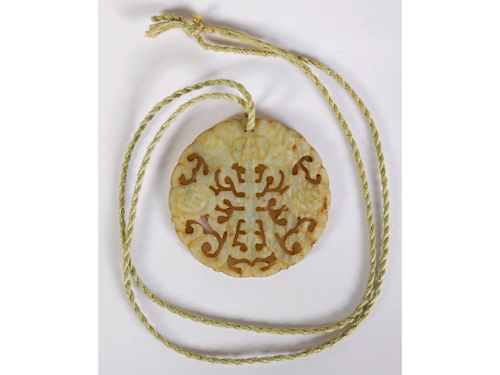 Appraisal: CHINESE CARVED AND PIERCED GREEN HARDSTONE CIRCULAR PENDANT on string