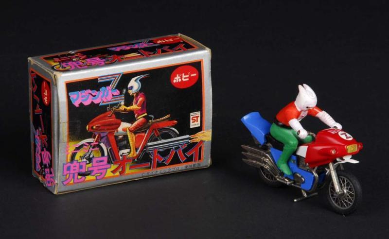 Appraisal: Kabuto Gou Motorcycle From Mazinger Z Description Japanese Made by