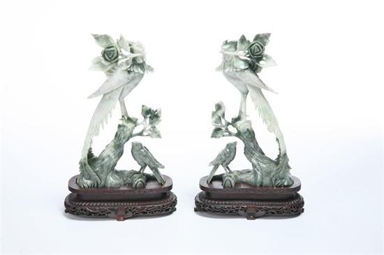 Appraisal: PAIR OF BIRD CARVINGS Chinese th century jade possibly Moss