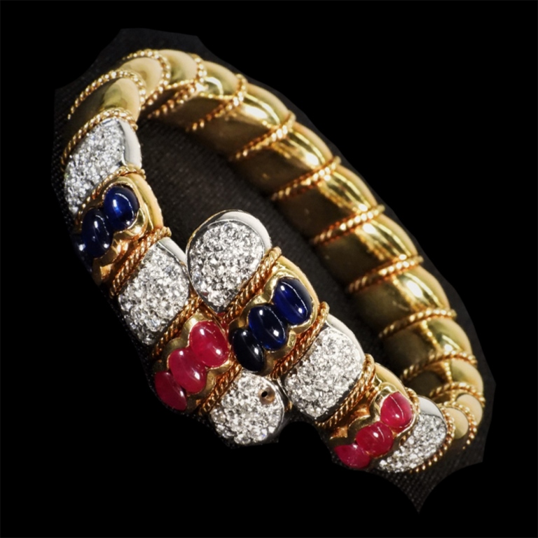 Appraisal: K GOLD DIAMOND CABOCHON MULTI STONE BRACELET K two tone