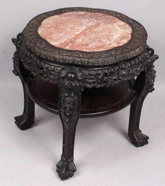 Appraisal: th Century heavily carved Chinese taboret stand with marble top