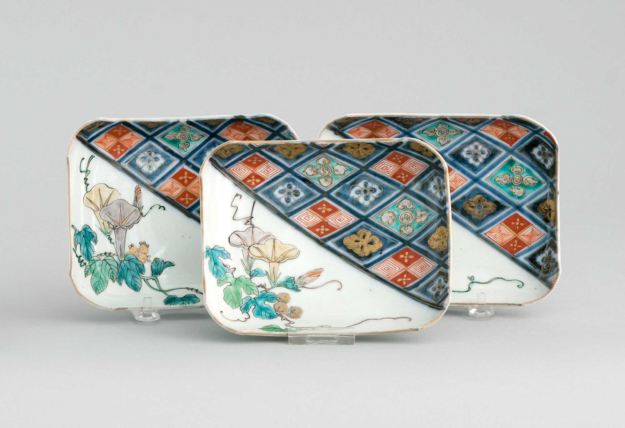 Appraisal: THREE IMARI PORCELAIN SUSHI DISHES th CenturyIn rectangular form with