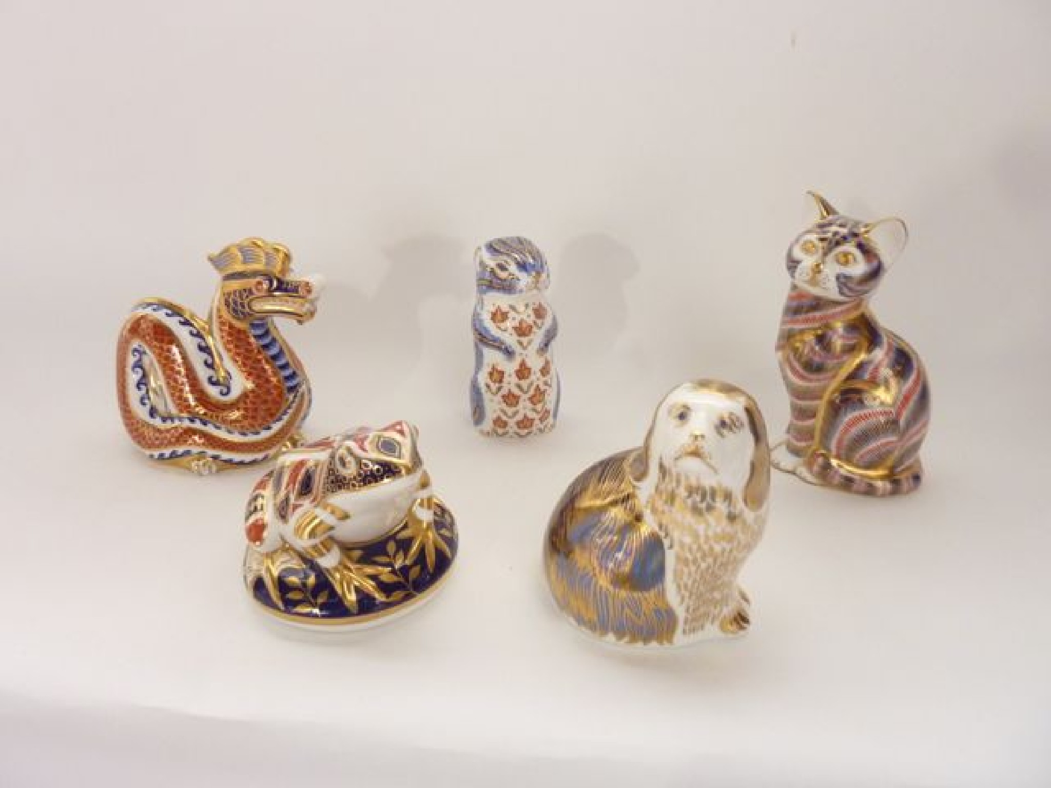 Appraisal: A collection of five Royal Crown Derby paperweights with Imari