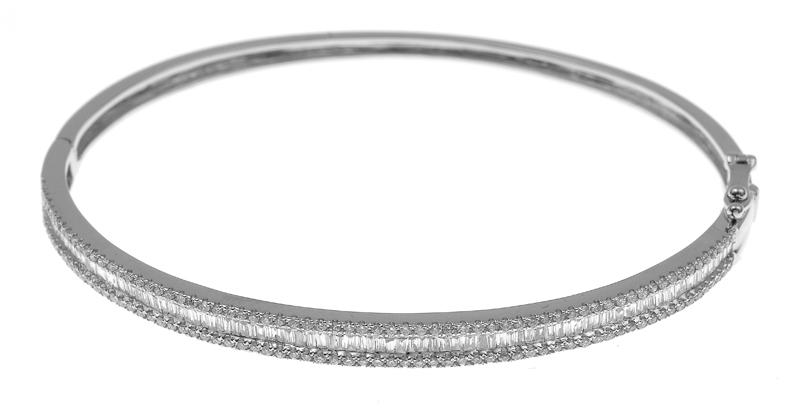 Appraisal: A DIAMOND HINGED BANGLE Comprising baguette and round brilliant cut