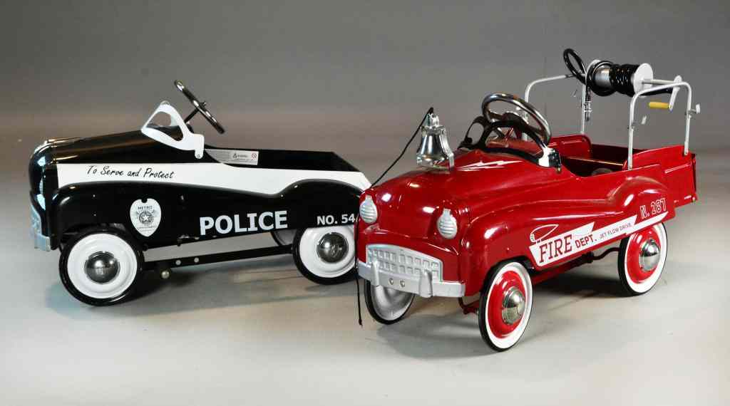 Appraisal: Vintage Reproduction Fire Police Pedal CarsA black and white police