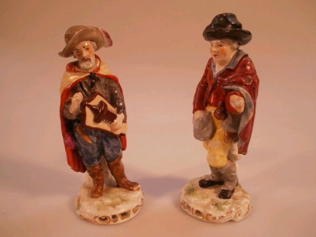 Appraisal: A pair of continental polychrome porcelain figures of a hurdy