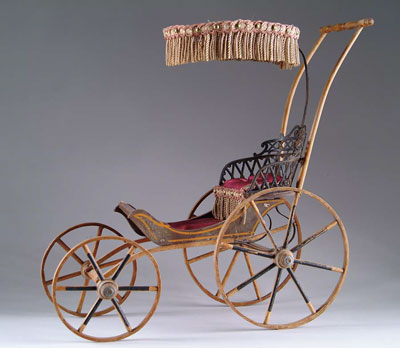 Appraisal: VICTORIAN DOLL BUGGY Outstanding Victorian buggy has wooden spoke wheels