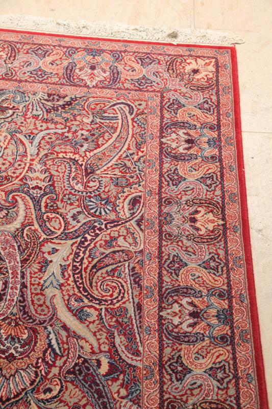 Appraisal: ROOM SIZE RUG Oriental style rug having a red border