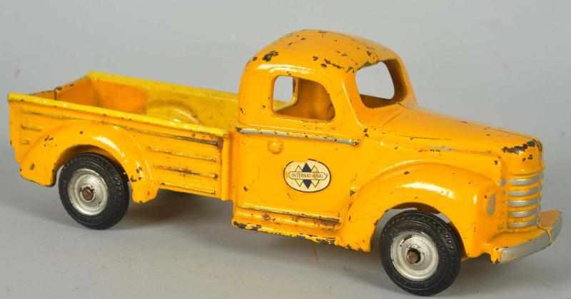 Appraisal: Cast Iron Yellow Arcade International Truck Average wear with chips