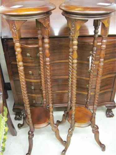 Appraisal: A PAIR OF MAHOGANY PEDESTAL PLANTSTANDS English Victorian design each