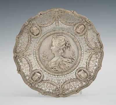 Appraisal: A Marked Silver Repousse Portrait Plate Center well with portrait