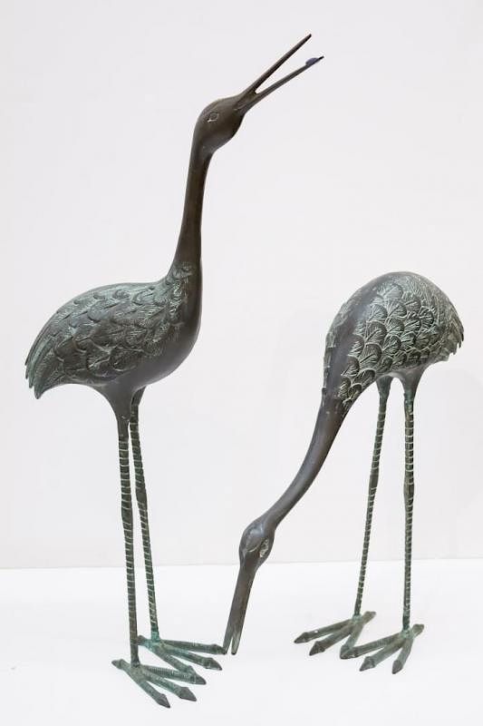 Appraisal: Asian Bronzed Metal Crane Sculptures Asian bronzed metal crane sculptures