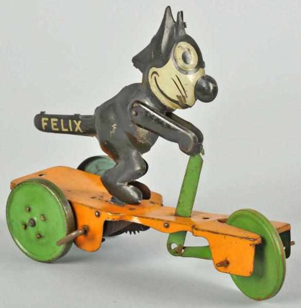 Appraisal: Tin Chein Felix the Cat Scooter Wind-Up Toy Description American