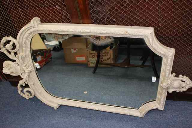 Appraisal: AN ANTIQUE WHITE PAINTED HANGING WALL MIRROR with arching glass