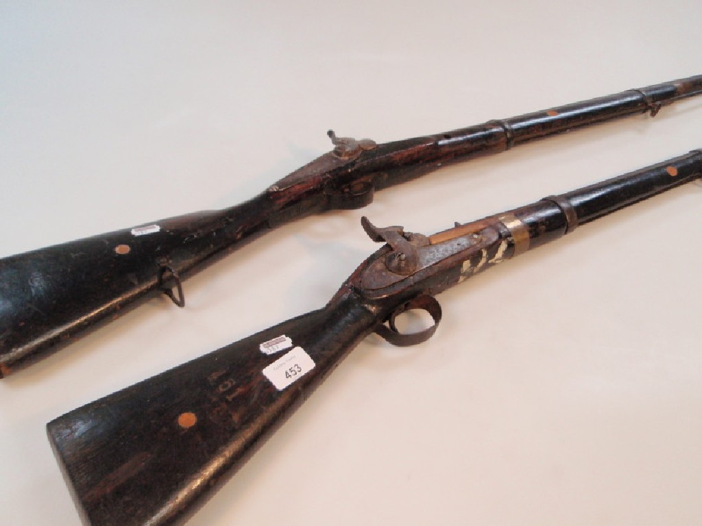 Appraisal: Two antique side lock percussion rifles AF