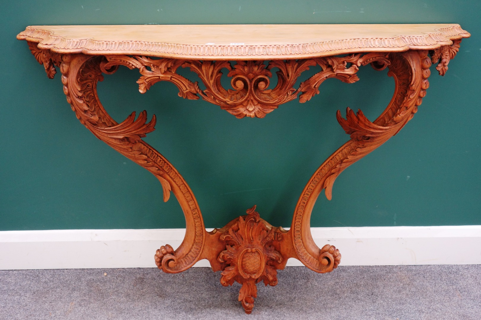 Appraisal: A th century North Italian carved pine console table on