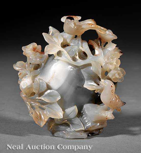 Appraisal: A Chinese Carved Agate Bird and Rock Group carved in