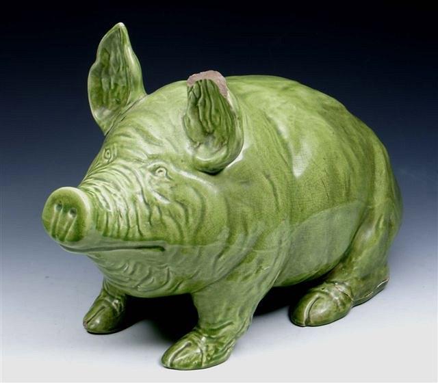 Appraisal: A LARGE WEMYSS PIG with lime green glaze impressed to