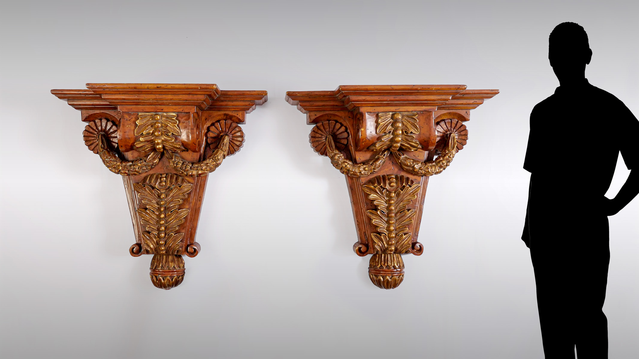 Appraisal: PAIR OF PALATIAL CARVED WALL SCONCES Having an overall draping