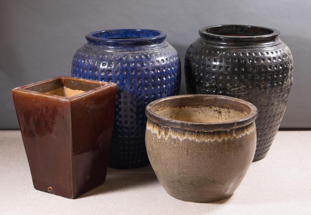 Appraisal: FOUR LARGE GLAZED POTTERY GARDEN PLANTERS H blue glaze jar