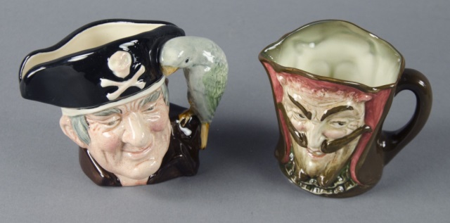 Appraisal: Two Royal Doulton Miniature Toby MugsIncluding one very early devil