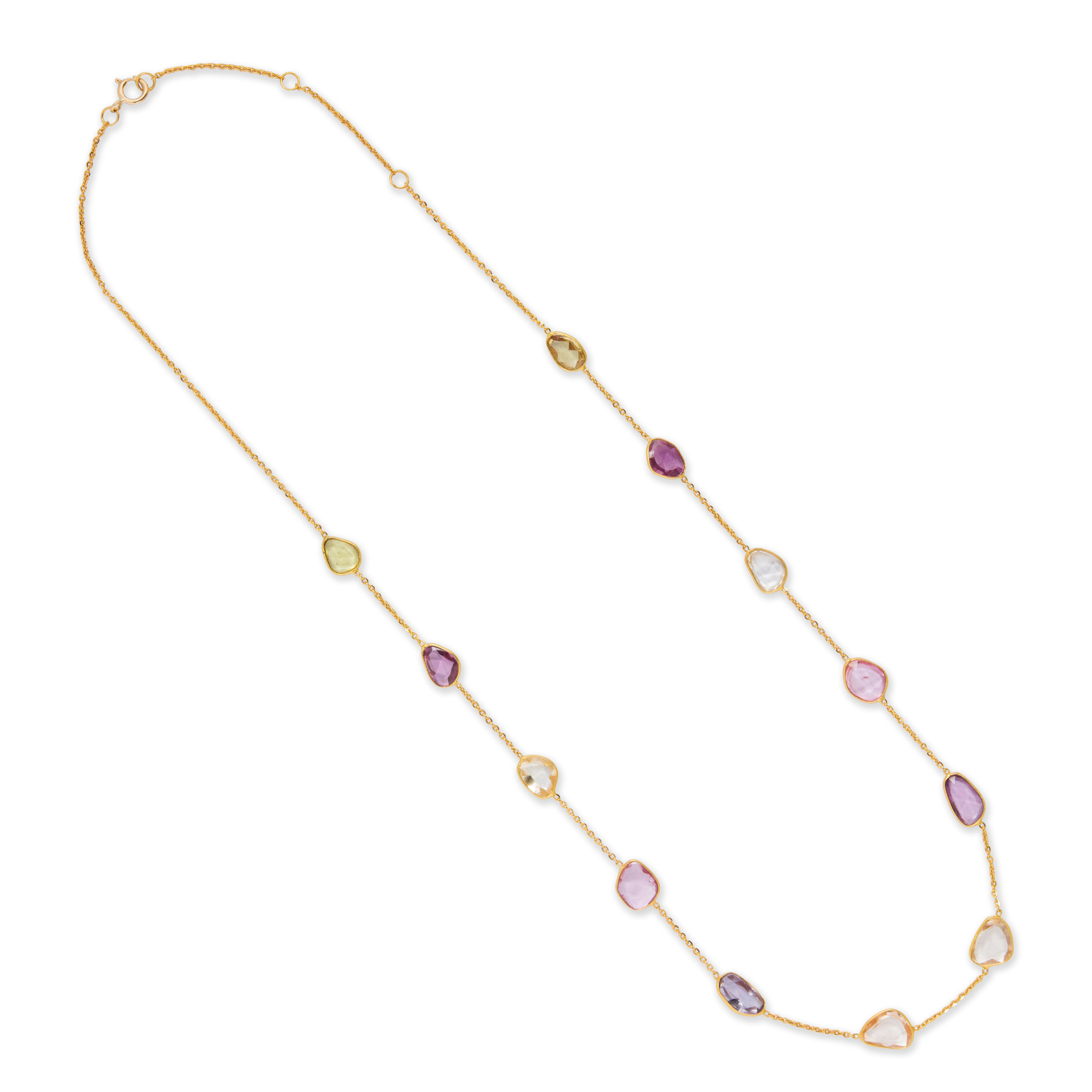 Appraisal: A MULTI-HUED SAPPHIRE AND EIGHTEEN KARAT GOLD NECKLACE A multi-hued