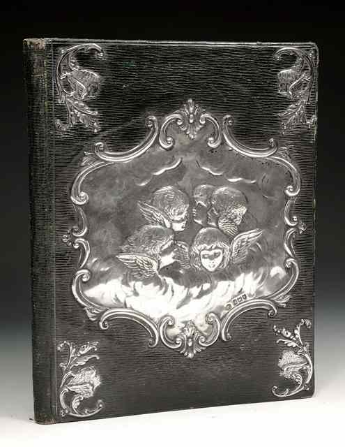 Appraisal: A LATE VICTORIAN LEATHER AND SILVER MOUNTED DESK FOLDER decorated