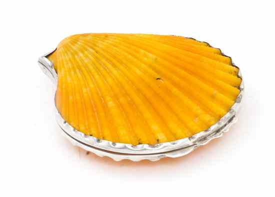 Appraisal: A Cartier Silver Mounted Sea Shell Compact having a bright