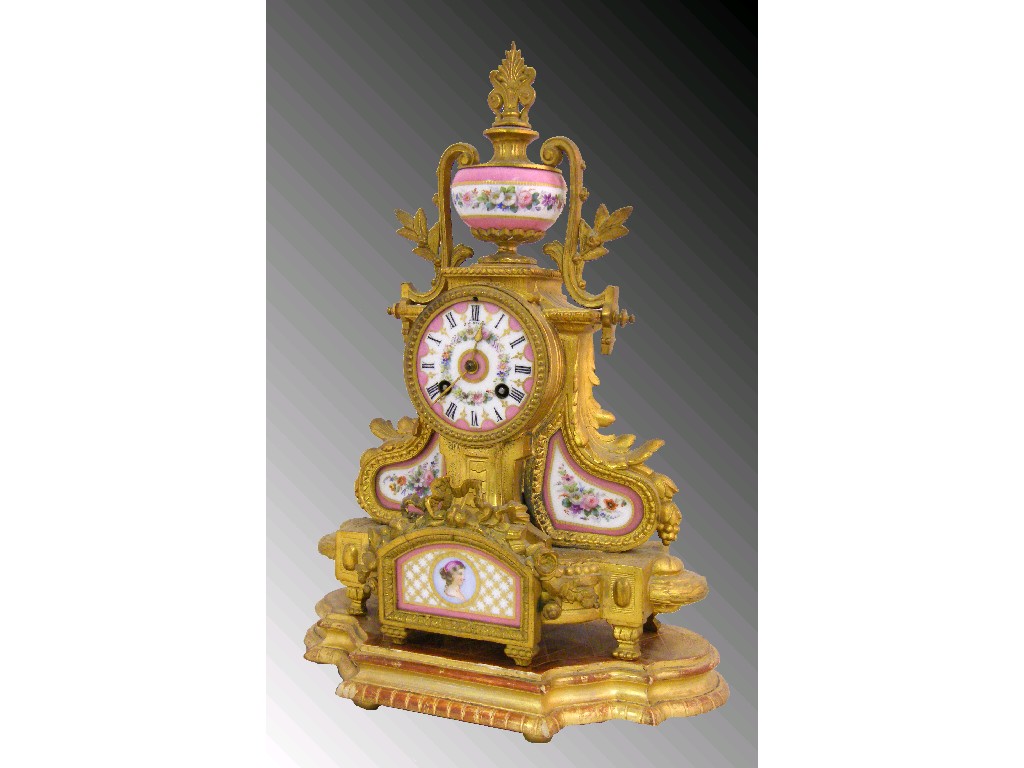 Appraisal: Gilt metal and porcelain mounted two train mantel clock the