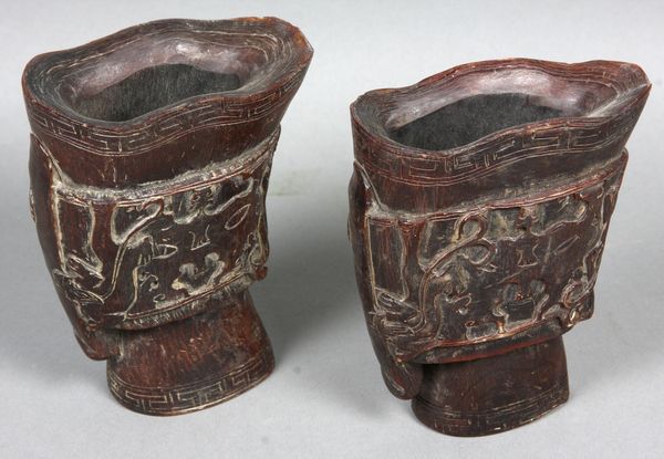 Appraisal: Chinese carved buffalo horn cups h x w EST '