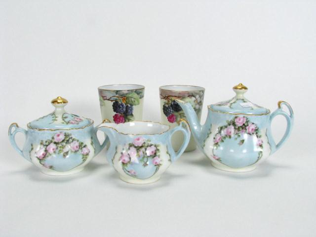 Appraisal: Bavarian porcelain tea set teapot sugar and creamer and two