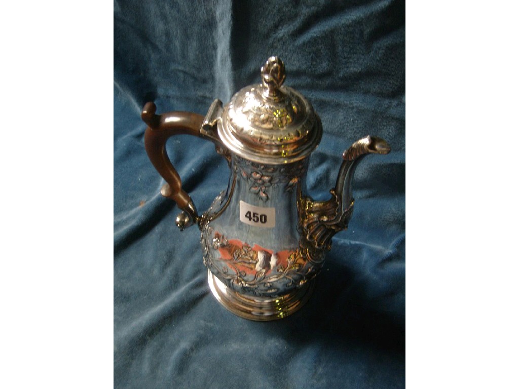 Appraisal: A Georgian silver coffee pot of baluster form with loop